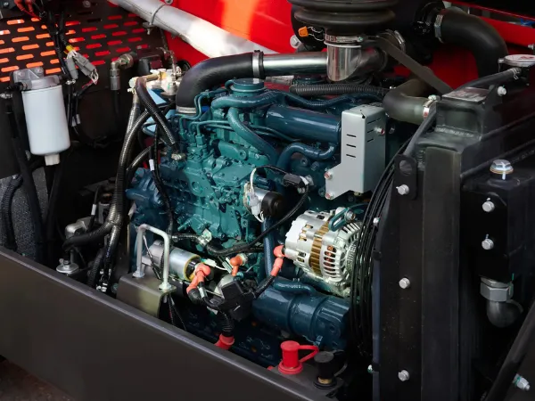 Industrial radiators are integrated into a large engine with visible components and pipes